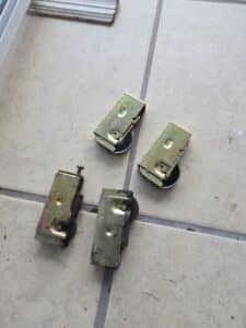 Sliding door rollers